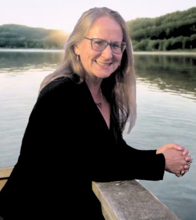 Theresa leaning by lake (2)